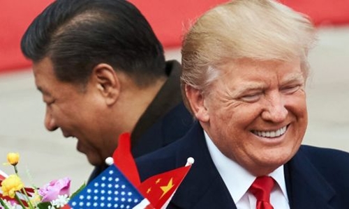 Chủ tịch Trung Quốc - Tập Cận Bình và Tổng thống Mỹ - Donald Trump tại Bắc Kinh. Ảnh: AFP