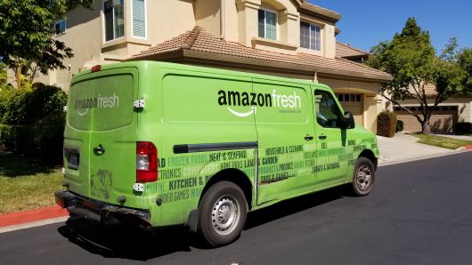 Amazon Fresh grocery delivery truck from the Amazon Prime service parked on a suburban street in San Ramon, California, July 5, 2018.