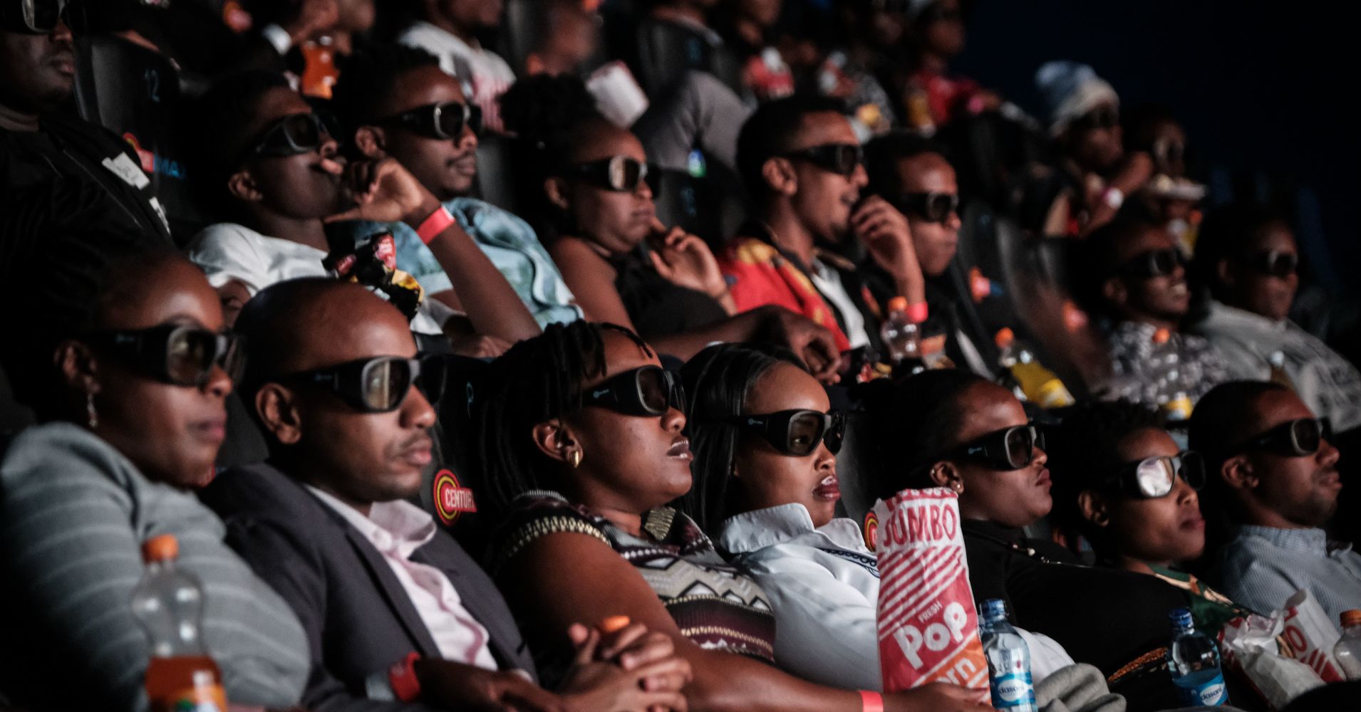 Invited guests watch the film "Black Panther" in 3D which featuring Oscar-winning Mexico born Kenyan actress Lupita Nyongo during Movie Jabbers Black Panther Cosplay Screening in Nairobi, Kenya, on February 14, 2018.