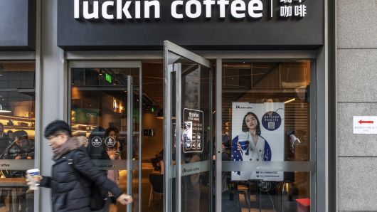 A customer exits a Luckin Coffee outlet in Beijing, China, on Tuesday, Jan. 15, 2019.