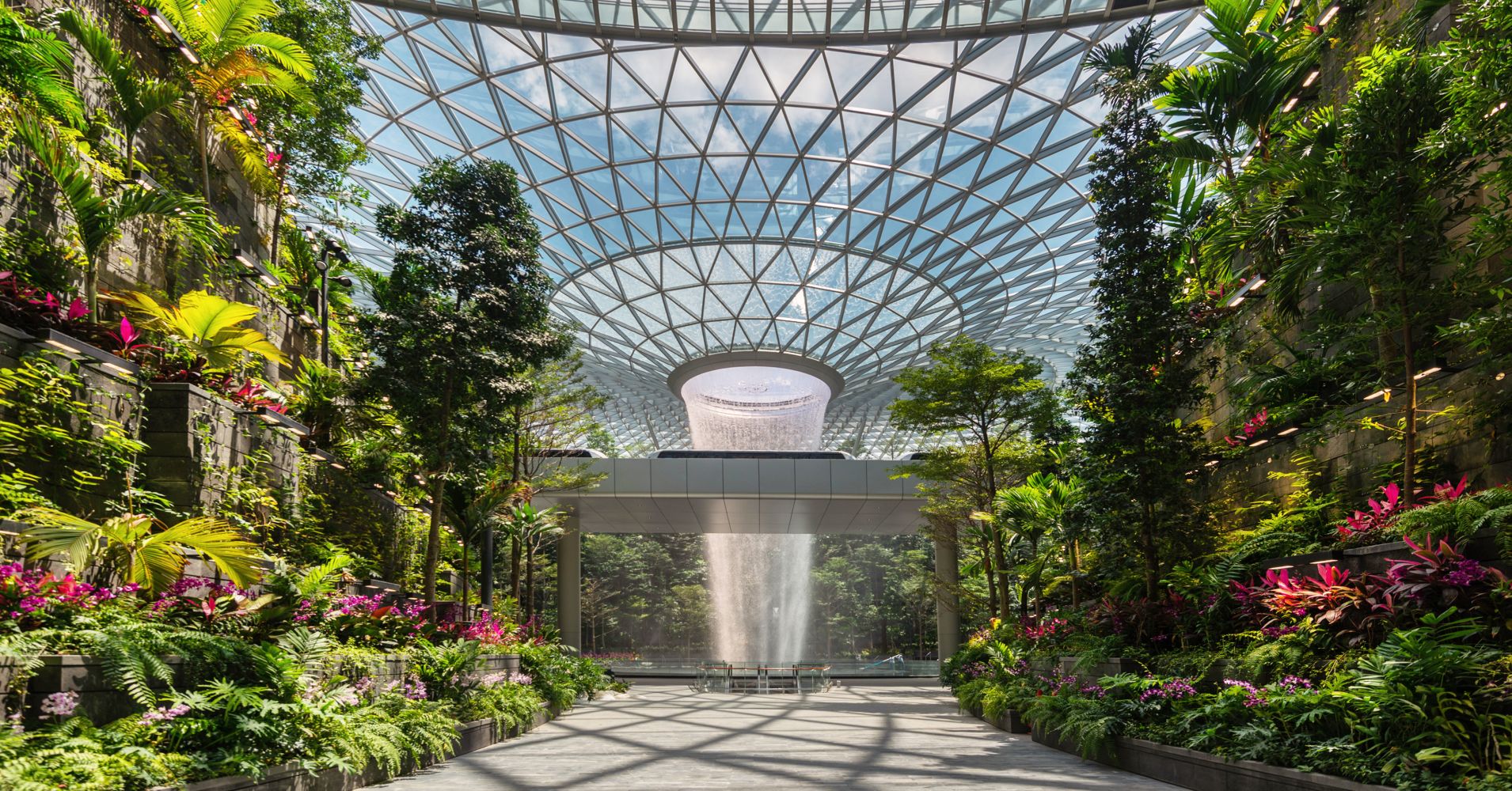 View of the Forest Valley and Rain Vortex from Terminal 1 at the Jewel Changi Airport.