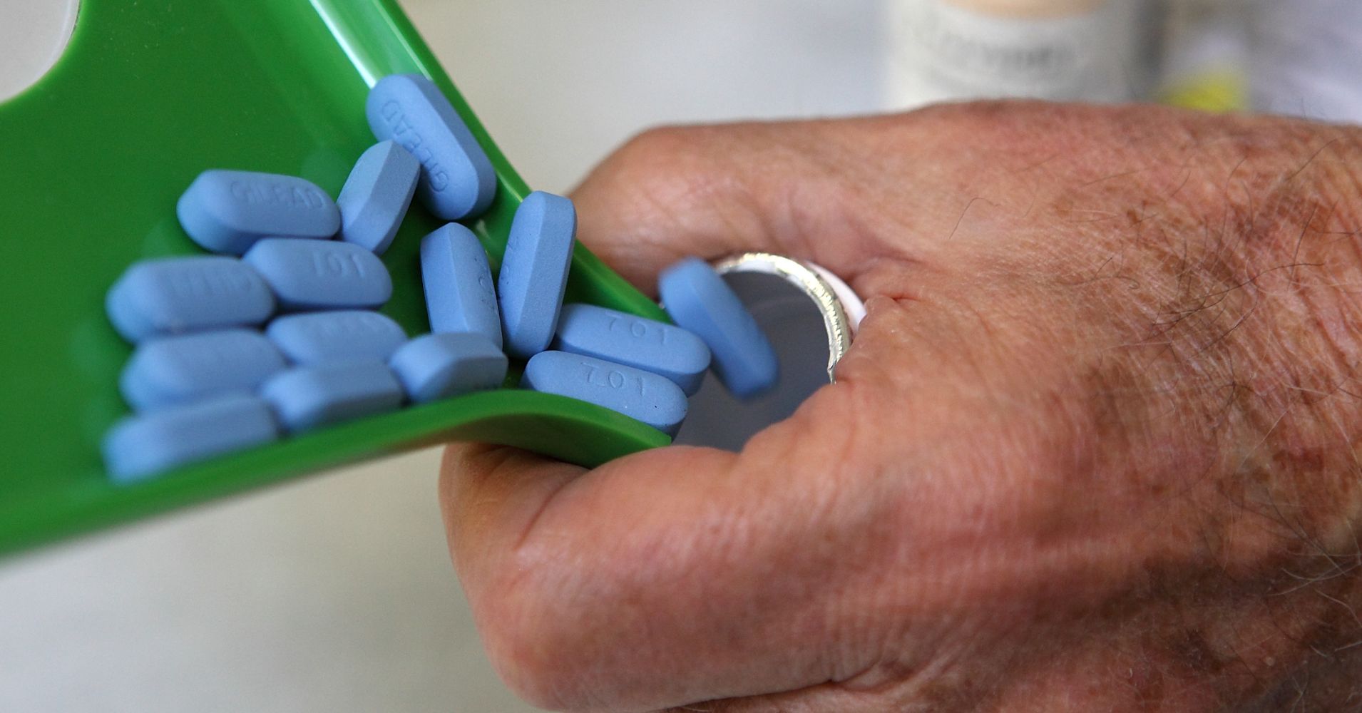 A pharmacist pours Truvada pills