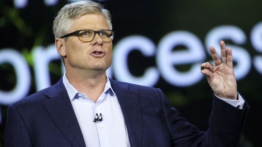 Steve Mollenkopf, chief executive officer of Qualcomm Inc., holds the new Snapdragon 835 chip during a keynote at the 2017 Consumer Electronics Show (CES) in Las Vegas, Nevada.