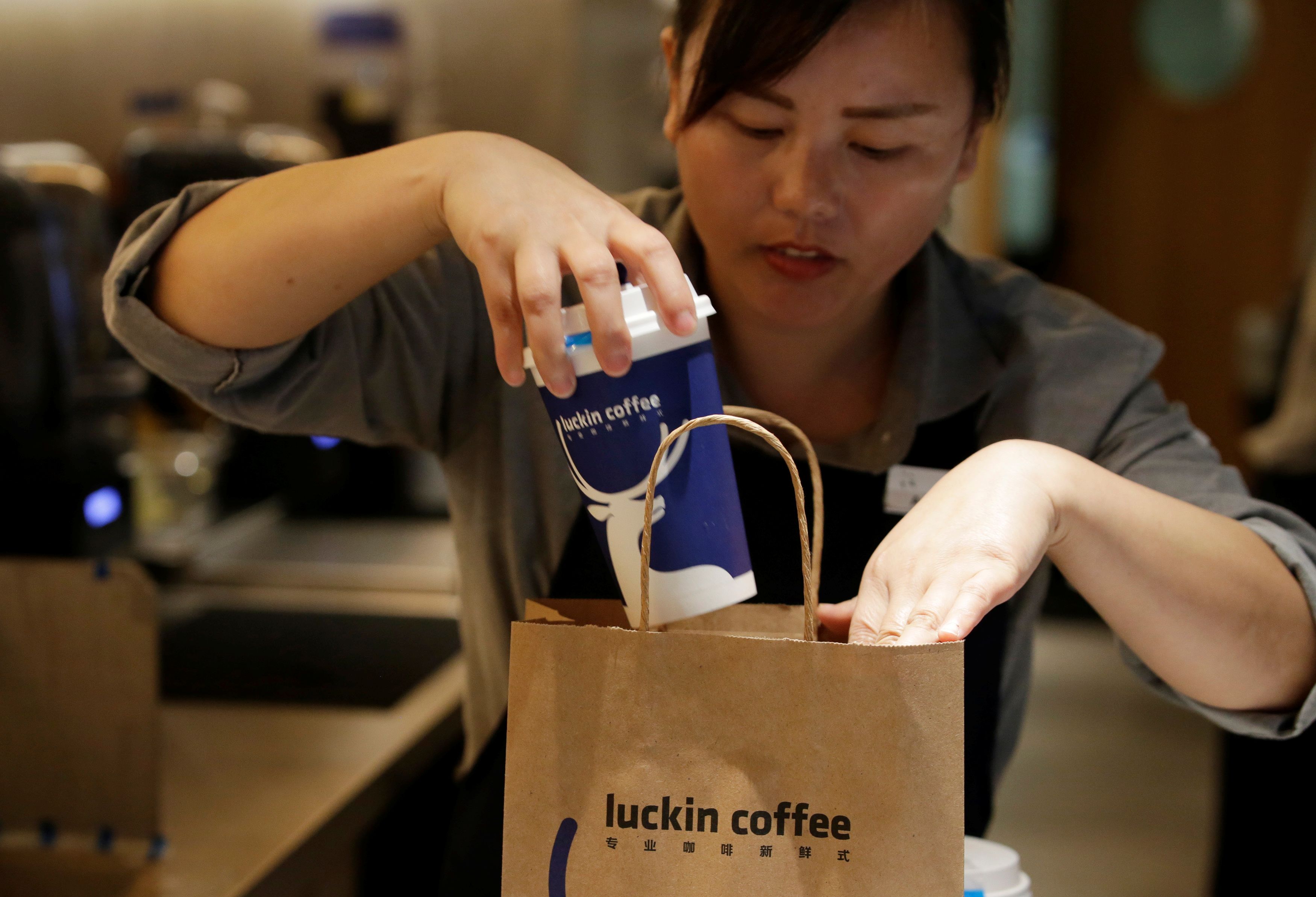 Starbucks' China challenger Luckin Coffee shares fall below IPO price