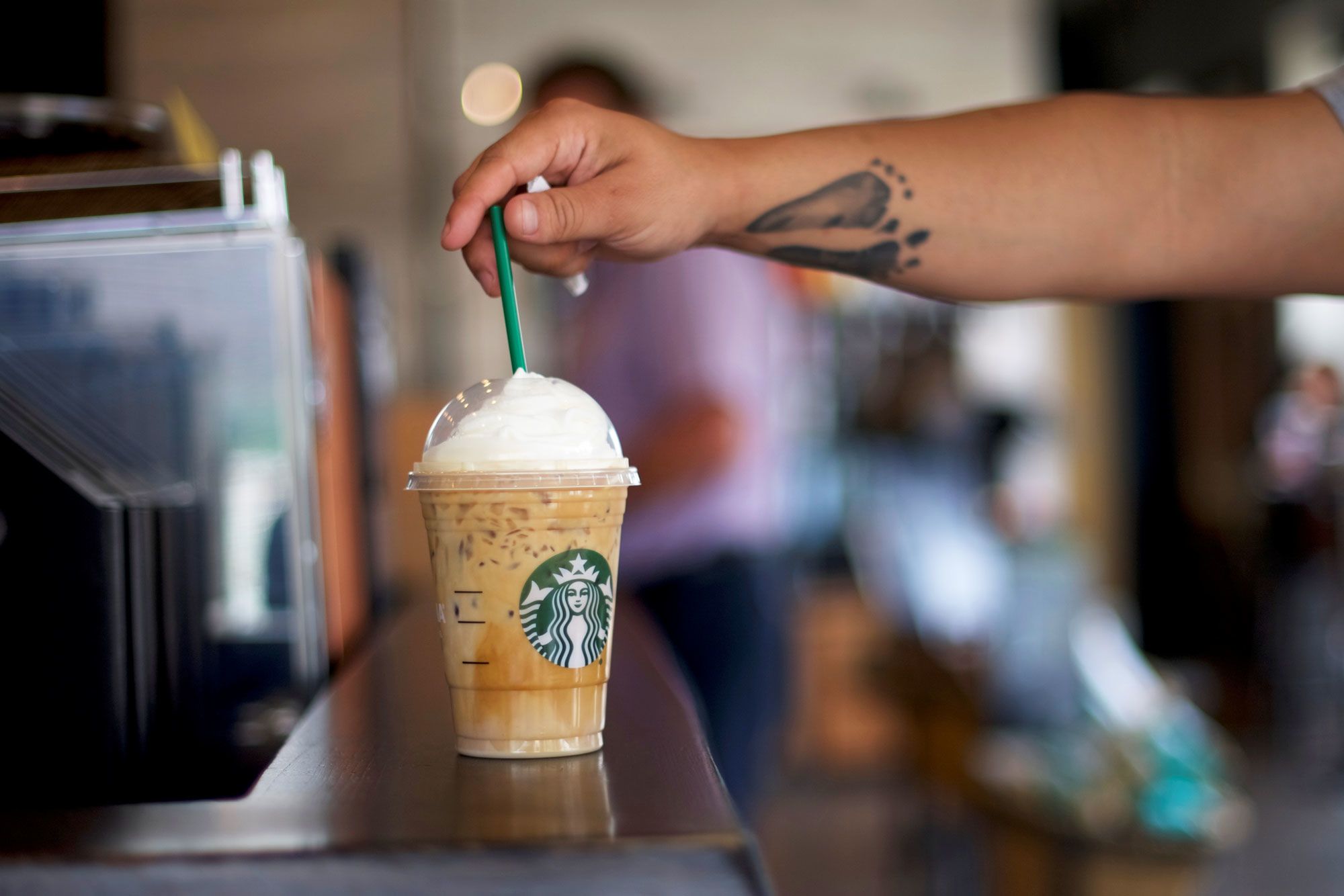 Starbucks and Dunkin' are 'defying the bears' — buy on a dip: Cramer