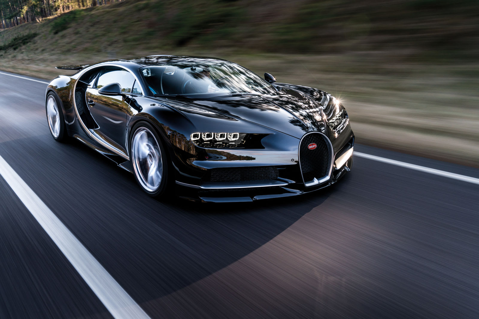 Bugatti hits 305 mph, breaks supercar speed record