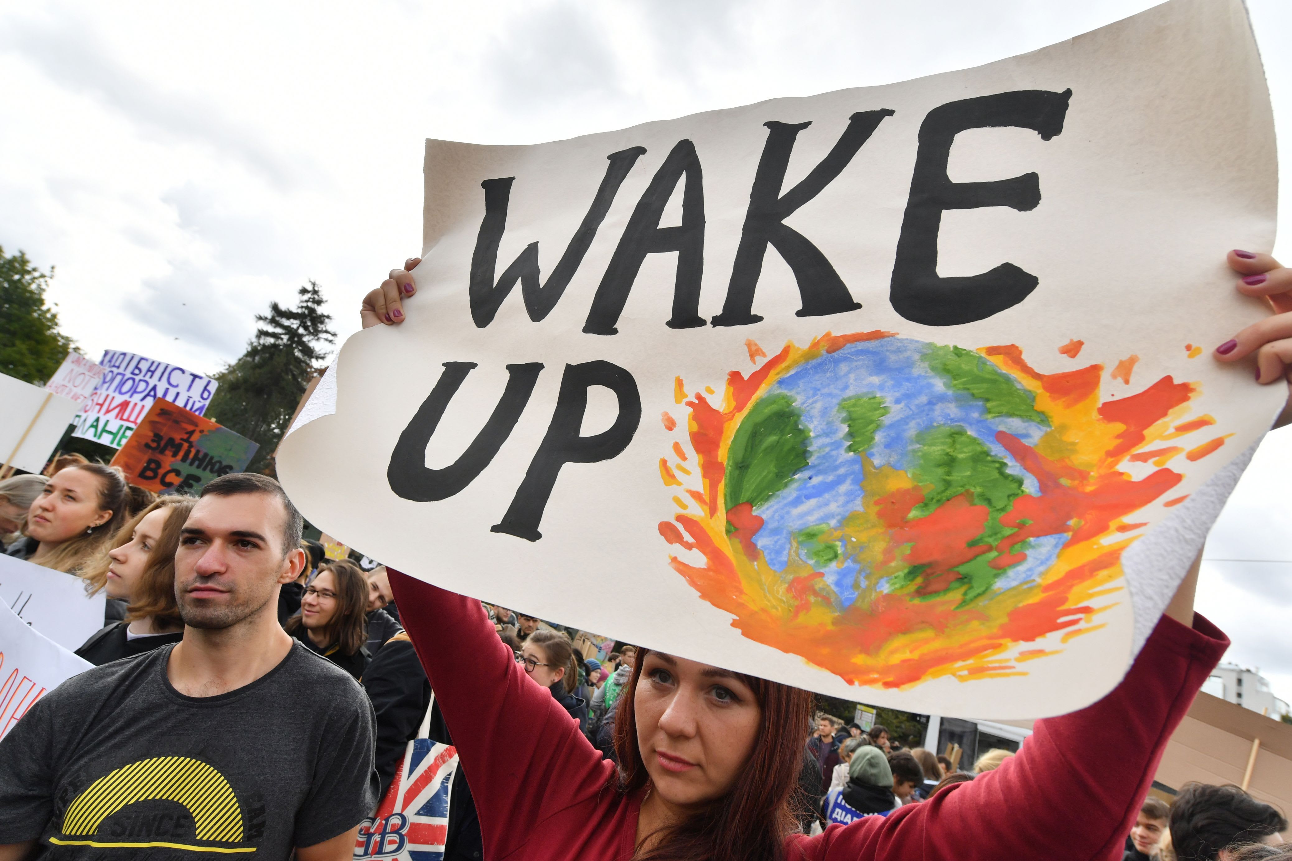 Millions of protesters worldwide come together to demand action on climate change