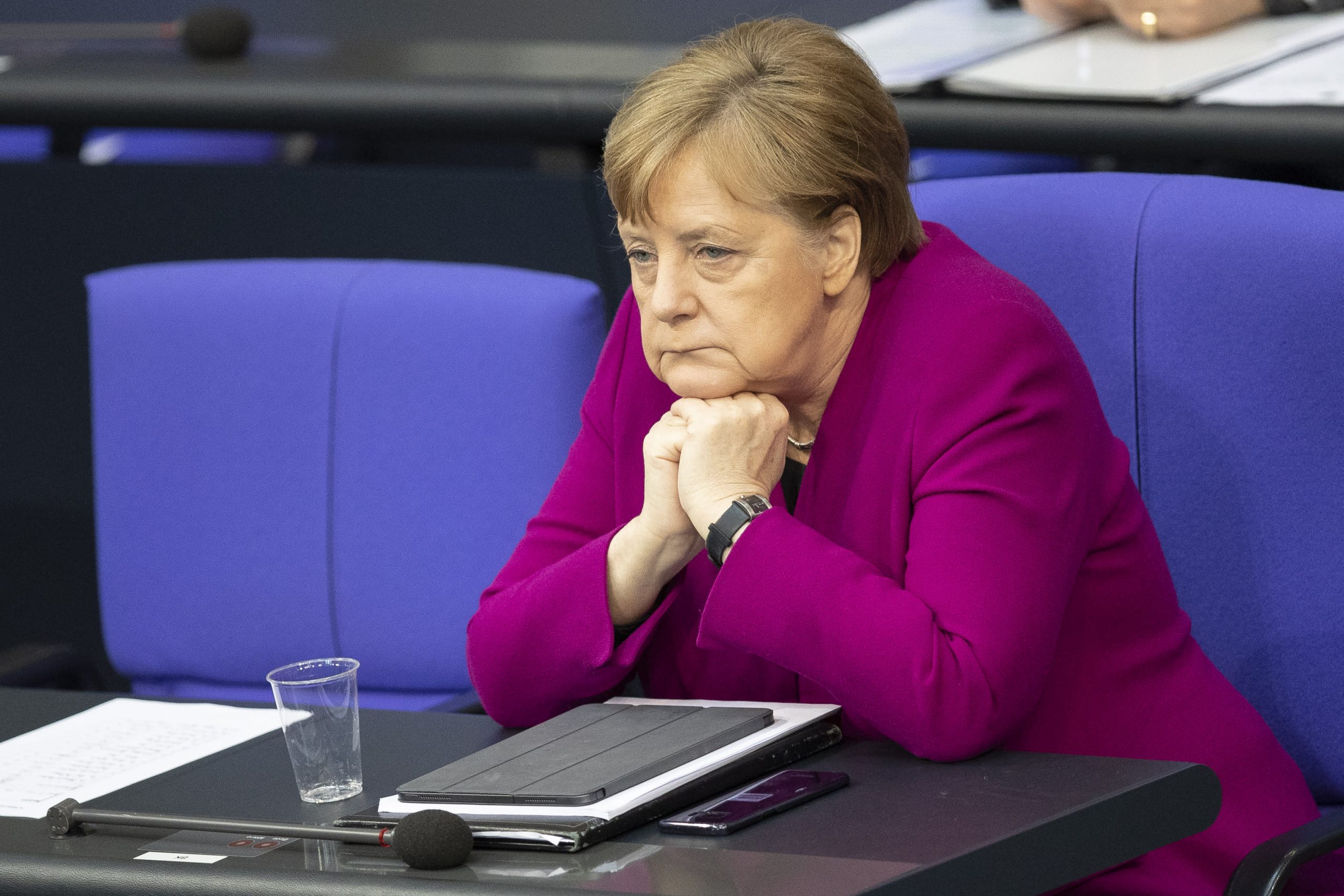 Merkel's bloc hits historic low in polls just as Covid rules start to loosen