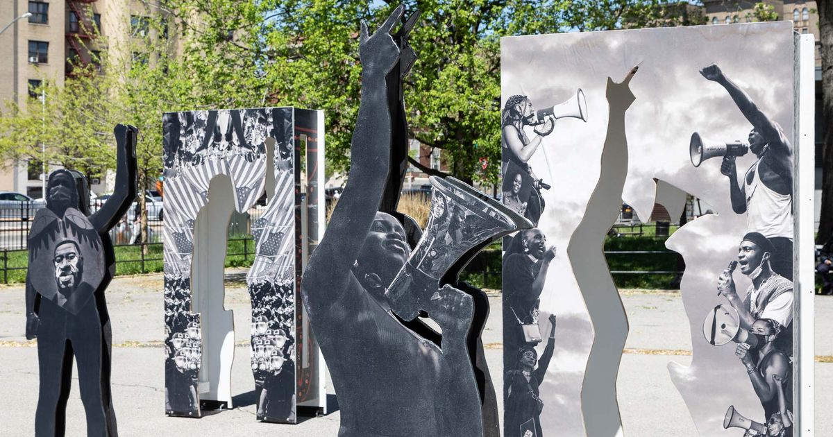 Plywood boards used to shutter New York shops are transformed into canvases for local artists